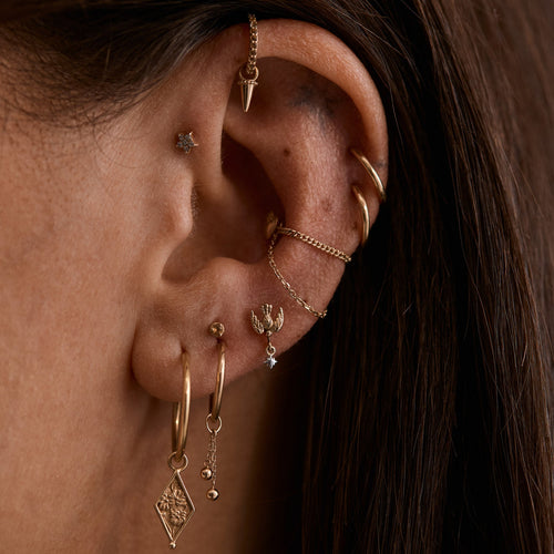 Golden Tear Piercing Charm